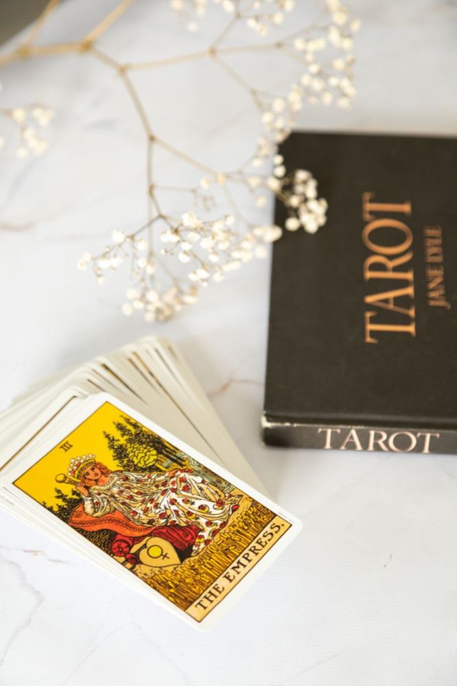Real cards, not gem currencies — divination as it was.