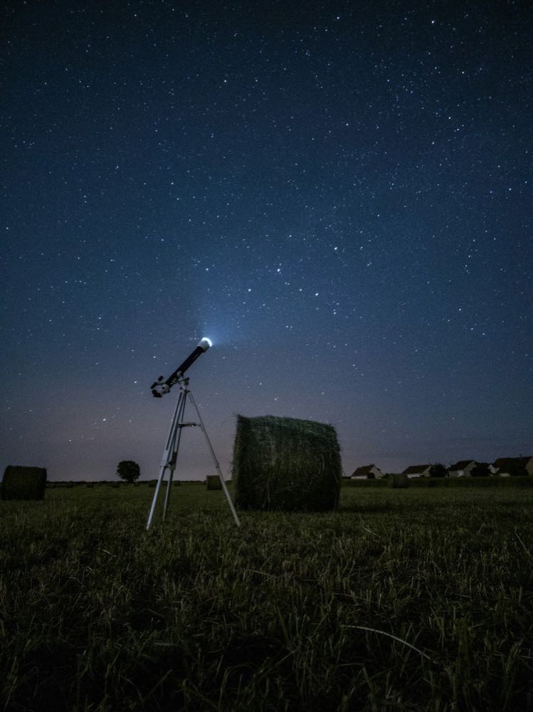 One birth chart illuminated beside ninety-four tradition symbols